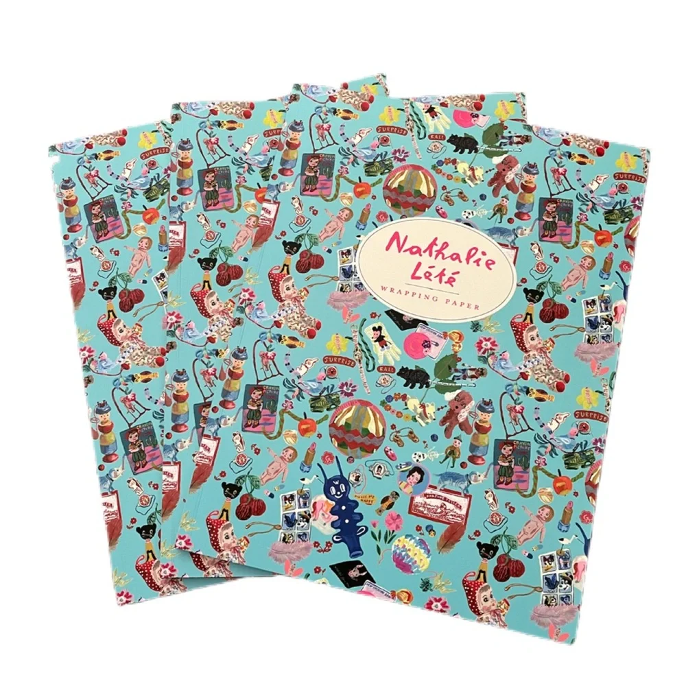 Nathalie Lété wrapping paper sheets book and matching sticker sheet. IN STOCK!